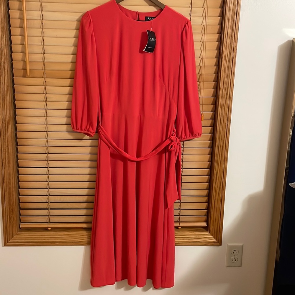 Beautiful dress strech its color is orange red